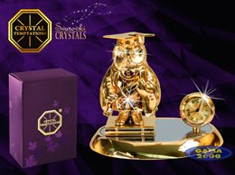 Figurka SWAROVSKI SOWA NA KSIĄŻCE Z ZEGAREM