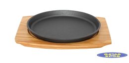 Naczynie żeliwne na desce